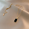 Black Octagon Gold Pendant Necklace